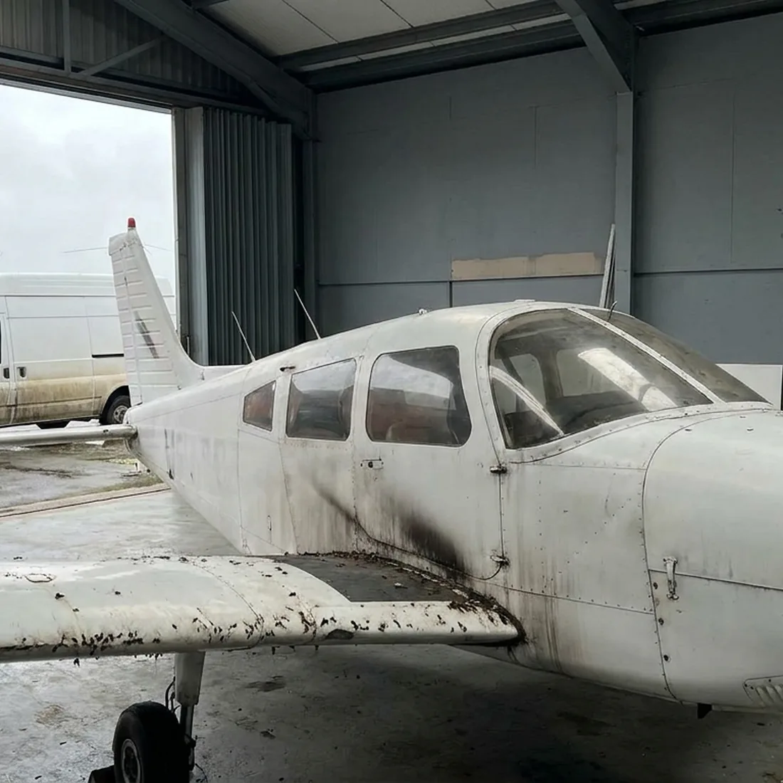 Light aircraft dull and grubby before cleaning