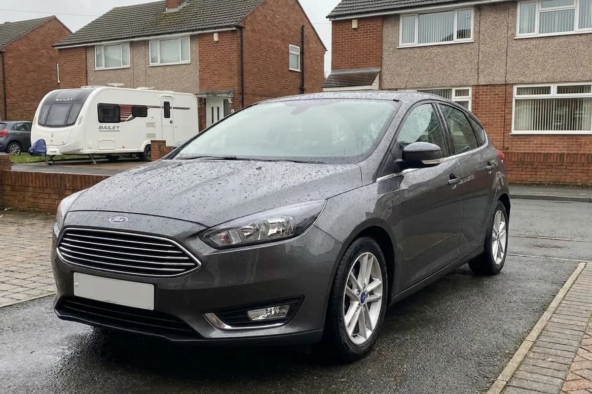 A detailed car on a Chester driveway