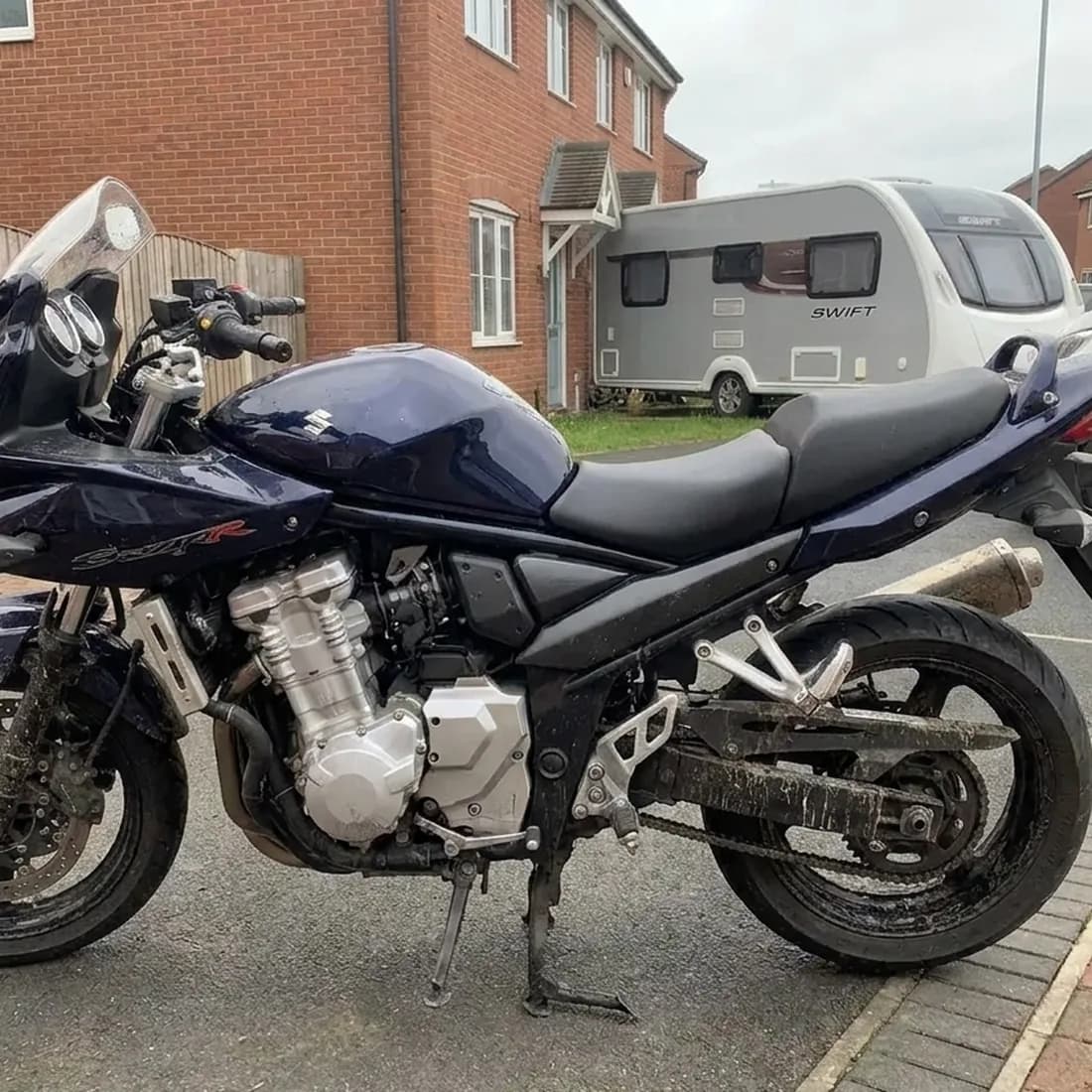 Tired, neglected motorbike before valeting