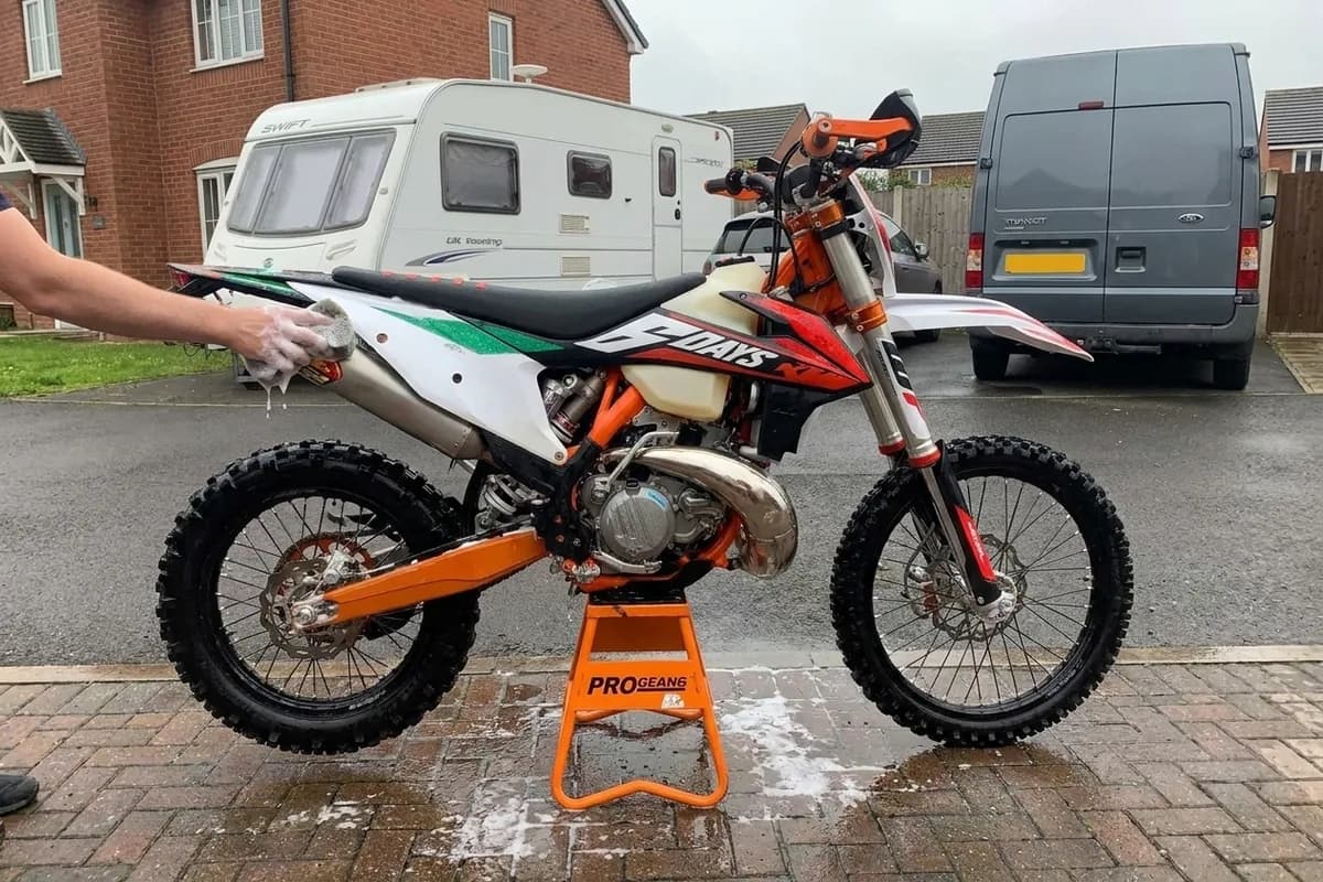 Motorbike being valeted by hand at home