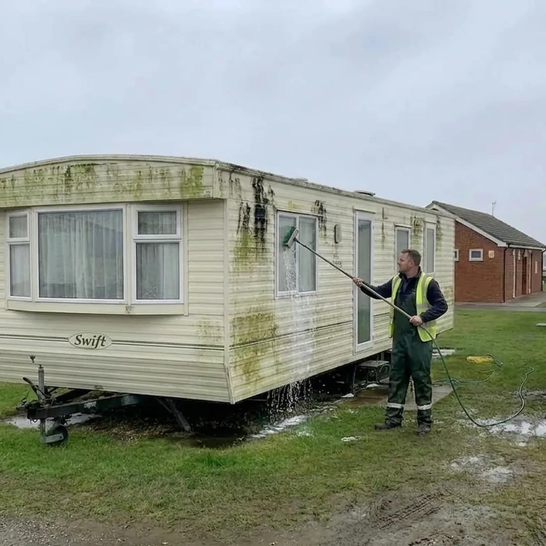 Static holiday caravan gone green before cleaning