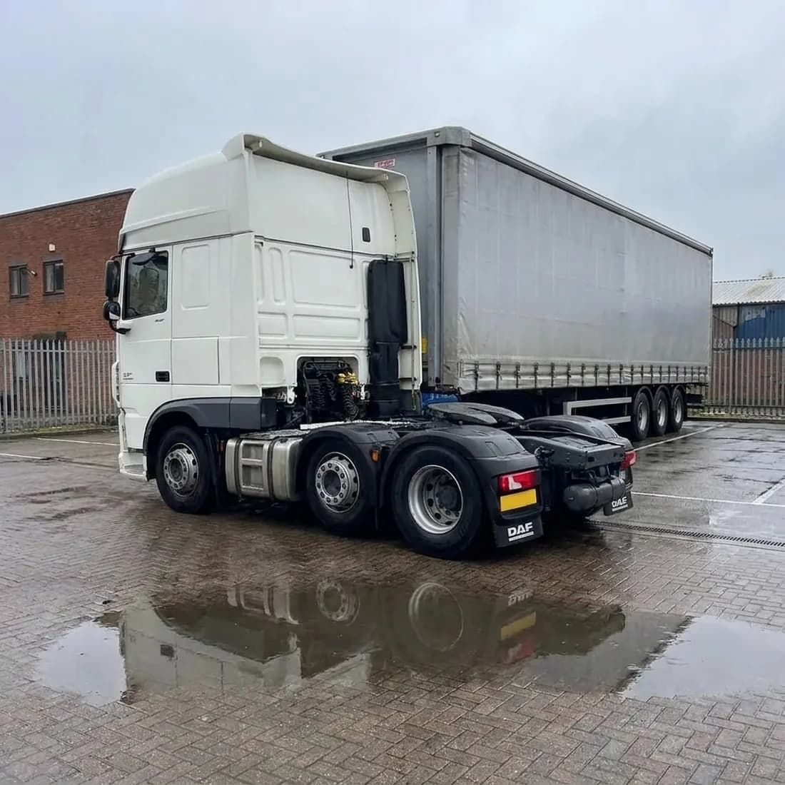 Clean HGV tractor unit on a haulage yard