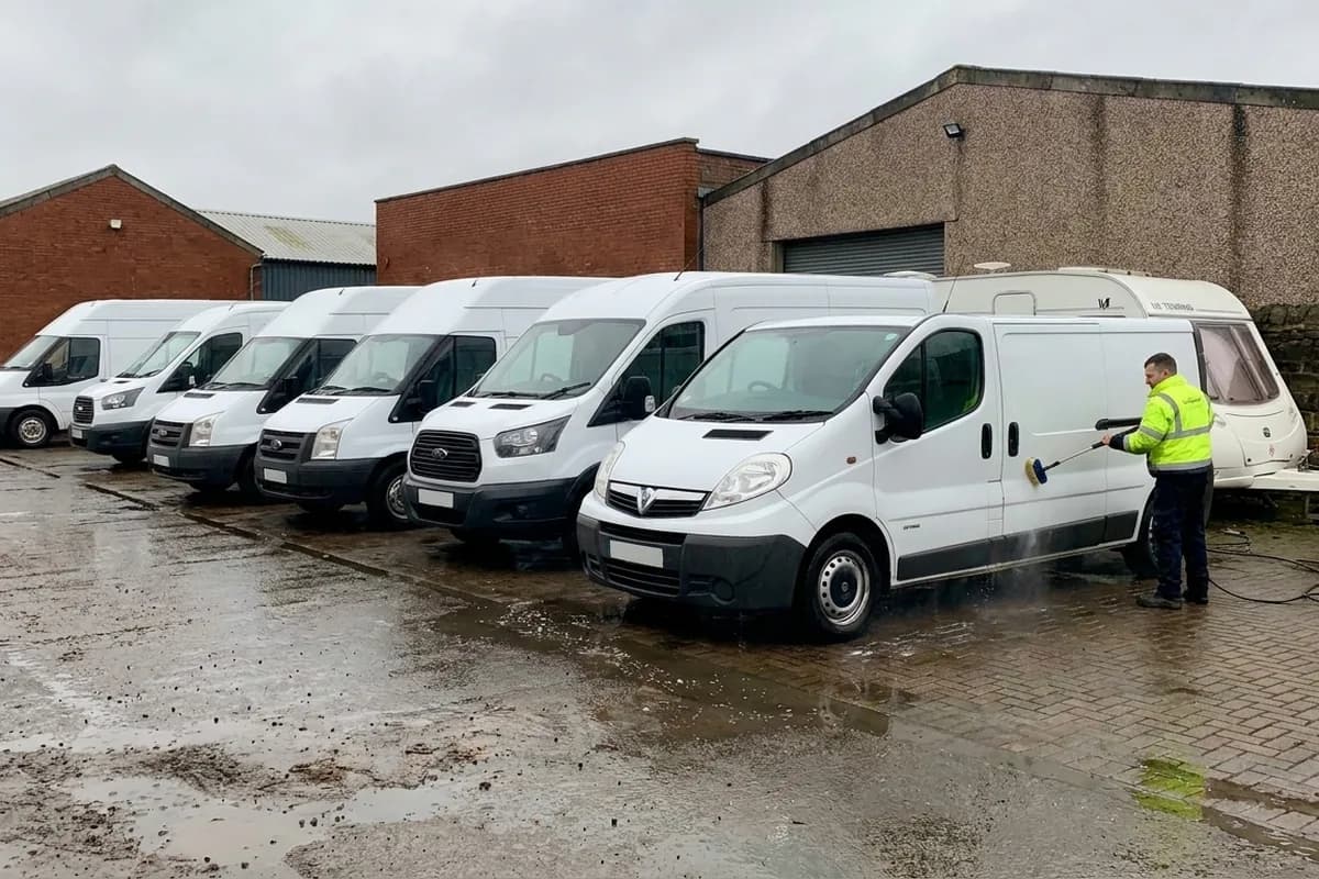 Sign-written work van cleaned on the yard